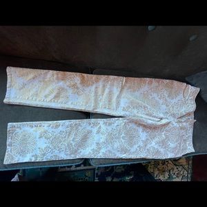 Really nice white and gold jean like pants. Stretchy